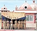Tense situation: Policemen guard the Sathya Sai Institute of Higher Medical Sciences where Sai Baba is undergoing treatment in Puttaparthi on Friday. AP