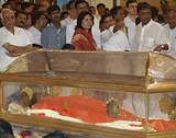 Sathya Sai Baba lying in an air-conditioned glass casket- AP photo