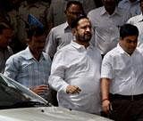 Suresh Kalmadi, former Chairman of the CWG Organizing Committee along with CBI officials leave from CBI headquarters to Patiala House court, after his arrest in connection with alleged irregularities in the Games projects in New Delhi on Tuesday. PTI