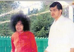 Confident: Sathyajith with the Baba.