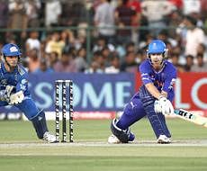 Rajasthan Royals Johan Botha, right, attempts a shot in front of Mumbai Indians wicketkeeper Davy Jacobs during an Indian Premier League (IPL) cricket match in Jaipur, India on Friday. AP Photo