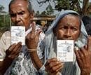 Elderly women show their marked fingers after casting their votes during the sixth phase of West Bengal Assembly polls at Barikula in Bankura district on Tuesday. PTI