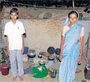 Against all odds: Shivananda Shetty with his mother Chandravva in their home at  Saidapura. DH Photo