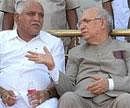 Karnataka Chief Minister B S Yeddyurappa and Governor H R Bhardwaj. File Photo
