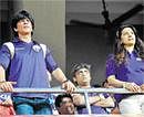 Cheering Shah Rukh Khan and Juhi Chawla at the stadium.