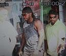 Gale: A TV grab of Royal Challengers Bangalore player Chris Gayle who was on a shopping spree on Brigade Road, on Thursday.