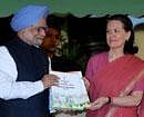 UPA chairperson Sonia Gandhi and Prime Minister Manmohan Singh release a report of the United Progressive Alliance titled "Report to the People 2010-2011"  on its second anniversary in New Delhi on Sunday.  PTI Photo
