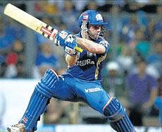 Mumbai Indians Aiden Blizzard plays off the back foot en route to his half-century against Kolkata Knight Riders on Wednesday. AFP