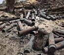 Fired ammunition lays on the ground near Libyan army tanks destroyed by NATO air strikes some kilometers before the east front line with Moammar Gadhafi forces, 25 km, 16 miles, from Misrata, Libya, Wednesday, May 25, 2011.AP Photo