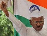 Social activist Anna Hazare raises slogans during his one-day fast in protest against police crackdown on Baba Ramdev and his supporters, at Rajghat in New Delhi on Wednesday. PTI