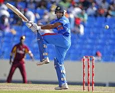 Rohit Sharma plays a shot during the third one-day international cricket match against West Indies in St. John's, Antigua, on Saturday. AP