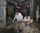 35 killed in twin Peshawar blasts