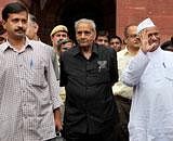 Civil society activists Anna Hazare, Arvind Kejriwal and Shanti Bhushan come out after the Lokpal Bill drafting committee meeting at North Block in New Delhi on Monday. PTI