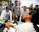 Job seekers inquire about job openings at a job fair in the US. NYT