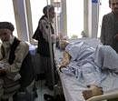 An Afghan man injured in a blast lies in a hospital bed in Kunduz city in the northern province of Kunduz, Afghanistan, on Saturday. AP