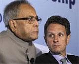 U.S. Treasury Secretary Tim Geithner participates in a conversation on India-U.S. relations with Finance Minister Pranab Mukherjee at a hotel in Washington, June 27, 2011. Reuters