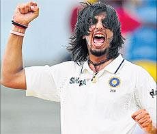 War cry: Indias Ishant Sharma exults after taking the wicket of West Indies captain Darren Sammy on Thursday. AP