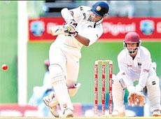 NEW KID ON THE BLOCK: Indias AbhinavMukund hits one to the boundary during his maiden Test fifty against theWest Indies on Friday. AFP