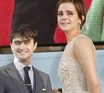 British actress Emma Watson, right, sheds a tear alongside Daniel Radcliffe, after they arrive in Trafalgar Square, in central London, for the World Premiere of Harry Potter and The Deathly Hallows: Part 2, the last film in the Harry Potter series- AP Photo