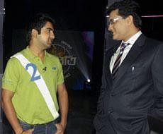 Former cricketer Sourav Ganguly talks with cricketer Gautam Gambhir during an interval of the shooting of a reality TV show in North 24 Pargana district in West Bengal on Saturday. PTI Photo
