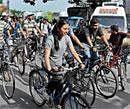 will on a wheel: Cycling enthusiasts at the launch of the cycle stand in Lalbagh on Sunday. dh Photo