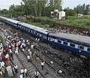 A view of the Kalka Mail passenger train which derailed near the town of Fatehpur in Uttar Pradesh on Sunday. AP