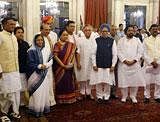 President Pratibha Patil and Prime Minister Manmohan Singh pose for a group photo with the new ministers during a swearing-in ceremony at the Rashtrapati Bhavan in New Delhi on Tuesday. PTI