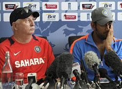 India coach Duncan Fletcher, left, and MS Dhoni answer a question during a news conference in Taunton, England, Thursday July 14, 2011. India will play their first match in their tour of England against Somerset starting  Friday. AP