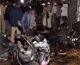 Policemen look for clues at blast site in Zaveri bazar, in Mumbai on Wednesday. PTI