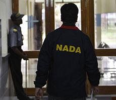 File photo of India's National Anti Doping Agency (NADA) official inspecting the Sports Medical Center at the Sports Authority of India complex during a raid. AP
