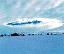 gaping hole Aircraft-induced hole observed at the West Antarctic Ice Sheet         Divide Camp, Antarctica on December 12, 2009. The hole first appeared on the horizon and then moved toward the camera. It is likely that a LC130 aircraft  produced the ice that formed the hole. Aircraft induced hole observed on January 29, 2007.