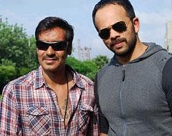 Director Rohit Shetty and actor Ajay Devgn promote their new film "Singham". PTI