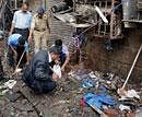 Forensic experts investigating near the Opera House blast site in Mumbai. File Photo/PTI