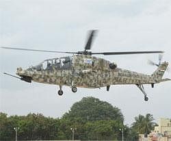 Caption: The second prototype of India's indegenous light combat helicopter while on a test flight.  IANS