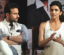 Actors Saif Ali Khan and Dipika Padukone interact with the students during a promotional event for their upcoming film "Aarkshan" in New Delhi on Friday. PTI Photo