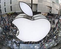 Customers wait outside Apple store in Munich- AP File Photo