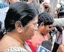 In the dock: Vijayalakshmi, wife of former chief minister Y S Rajasekhara Reddy outside her residence after the CBI raided the properties of her son Y S Jaganmohan Reddy in Hyderabad on Thursday. PTI Photo