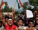 Anna Hazare supporters shouting slogans outside the Tihar Jail in New Delhi on Thursday. PTI