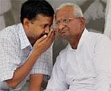 Anna Hazare having a word with Arvind Kejriwal during 6th day of his fast against corruption at Ramlila ground in New Delhi on Sunday. PTI Photo