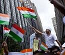 Members of "India against corruption" wave their flags during the 31st India Day Parade in New York. AP Photo