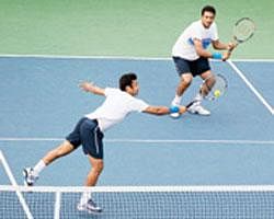 Leander Paes and Mahesh Bhupathi in action against Bob and Mike Bryan, in Mason, on Saturday. (AFP)