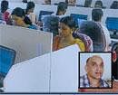 Employees at the BPO run by Narayana Bhide (inset) at Mundaje in Belthangady taluk.