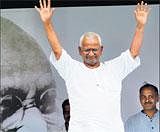 Anna Hazare gestures during the eighth day of his fast at Ramlila Grounds in New Delhi on Tuesday. PTI