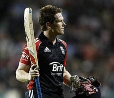 England's Eoin Morgan walks from the pitch after loosing his wicket for 49 during his team's win over India in their Twenty20 cricket match at Old Trafford cricket ground, Manchester, England, on Wednesday. AP