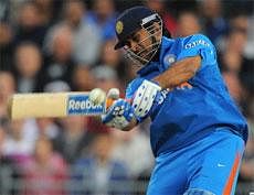 M S Dhoni bats during the 20-20 cricket match between England and India at Old Trafford cricket ground in Manchester, north-west England on Wednesday. AFP