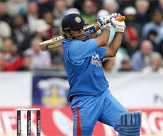 MS Dhoni plays a shot against England during the first one day international cricket match at the Riverside Cricket Ground in Durham, England on Saturday, AP