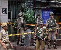Security personnel secure the site of the blast outside the Delhi High Court in New Delhi on Wednesday . PTI