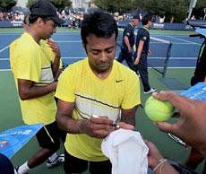 Leander Paes with Mahesh Bhupati during the Men's Doubles tournament at Flushing Meadows in New York PTI Photo