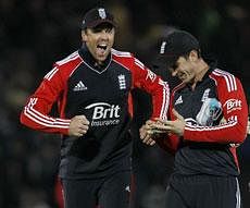 England's Graeme Swann, left, and Craig Kieswetter, right. AP Photo