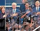 Remembering heroes: (From left) Former first lady Laura Bush, former US President George W Bush, First Lady Michelle Obama and US President Barack Obama stand at  attention as the national anthem is played during the 10th anniversary observance of   terrorist attacks on the World Trade Center, in New York on Sunday. AP